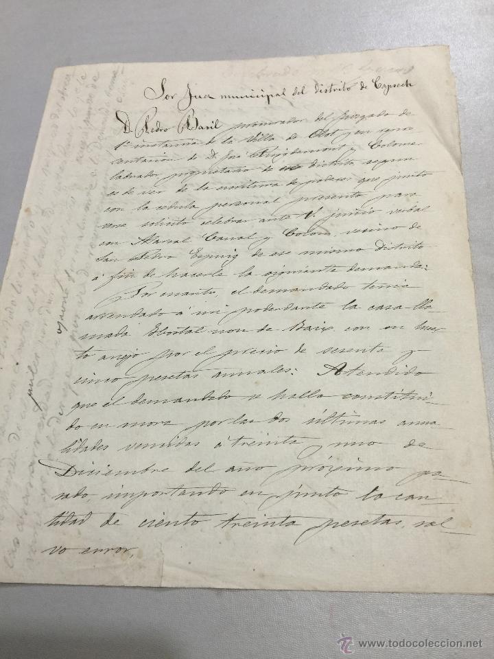 Carta antigua manuscrita abierta