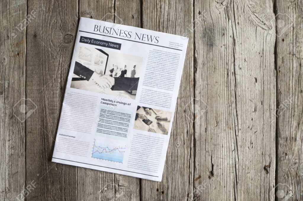 Cómo saber cuántas columnas tiene un periódico 14 73022919 periodico en la mesa de madera