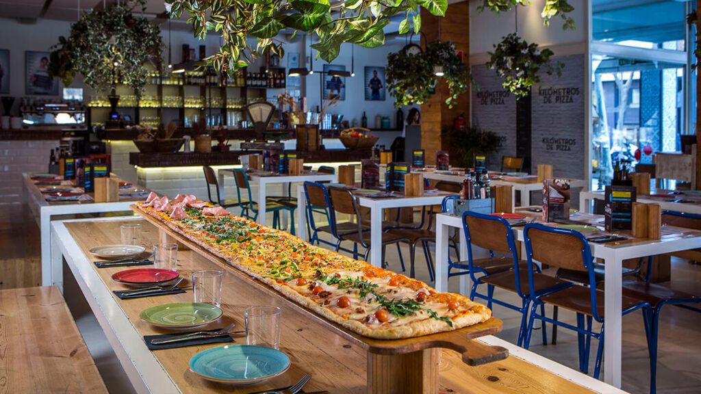 Qué opinan los clientes sobre Kilómetros de Pizza en X-Madrid 16 kilometros pizza